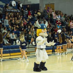 WWU's mascot Victor Viking standing on the court in Carver Gym
